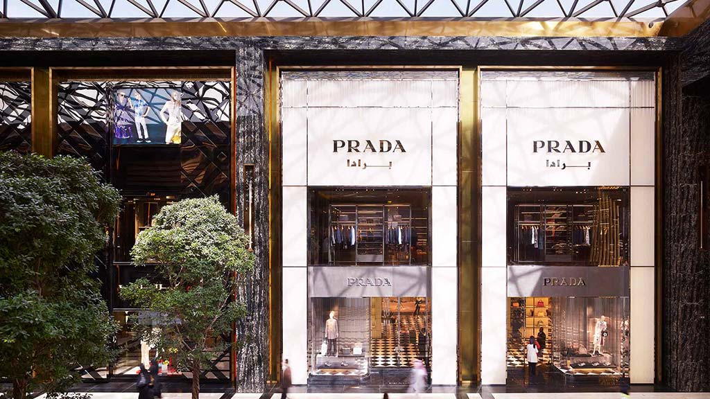 A building with a large glass window.