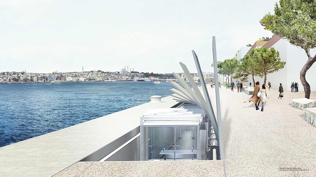 A white building with a glass wall by a body of water.