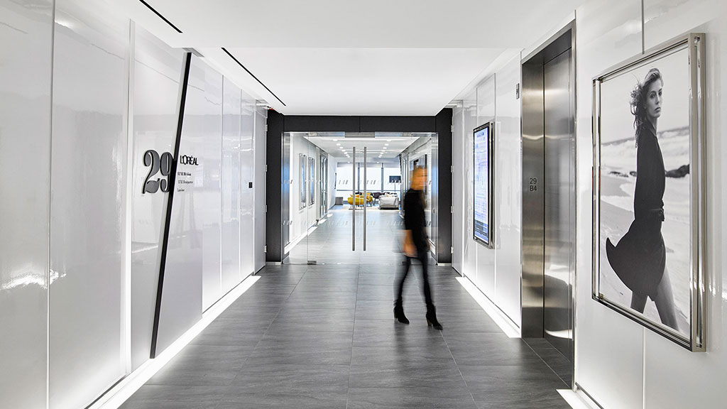 A person walking in a hallway.