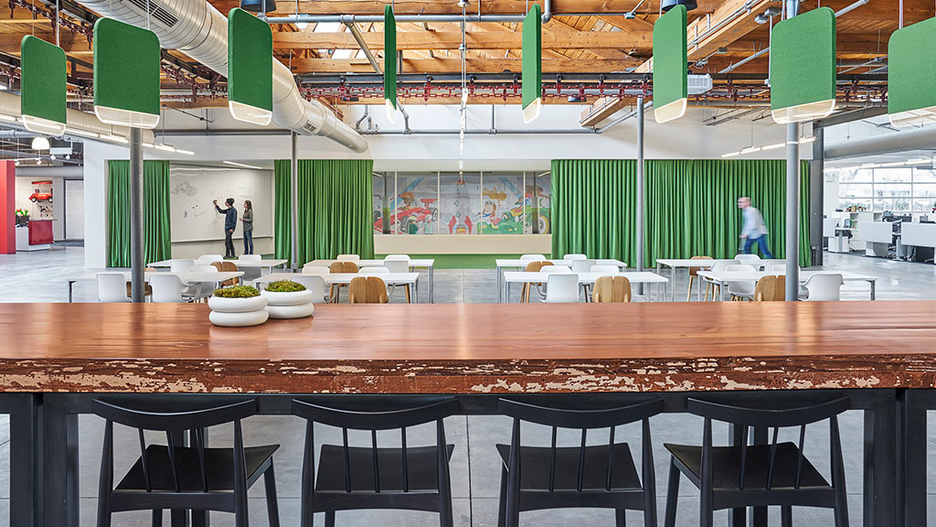 A room with tables and chairs.