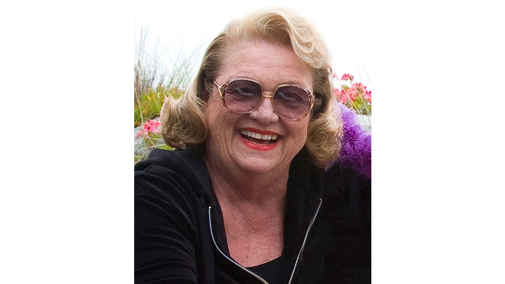 A woman wearing glasses.