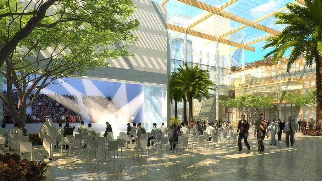 A group of people sitting in a large room with a large glass wall.
