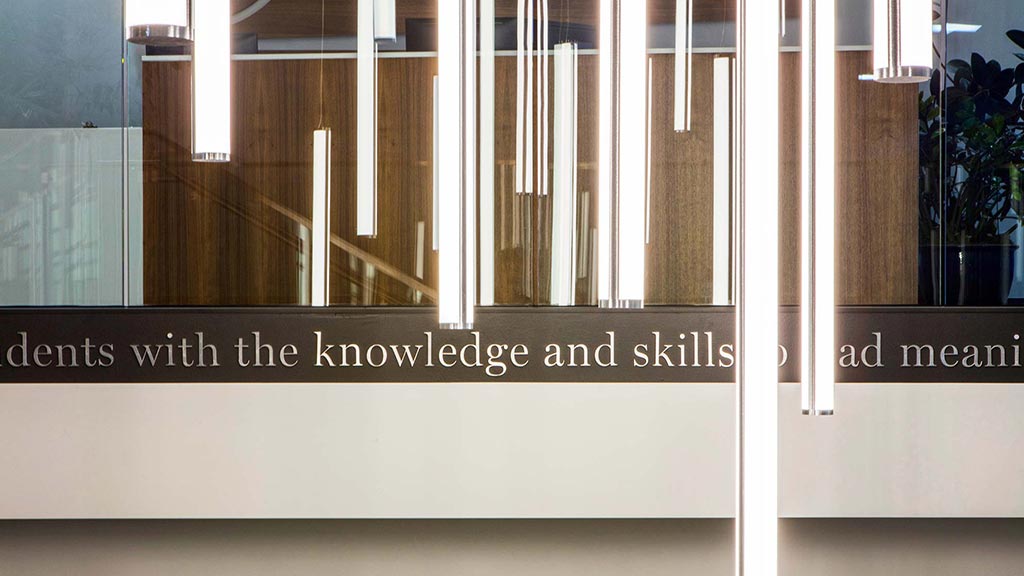 A building with a sign on the side.