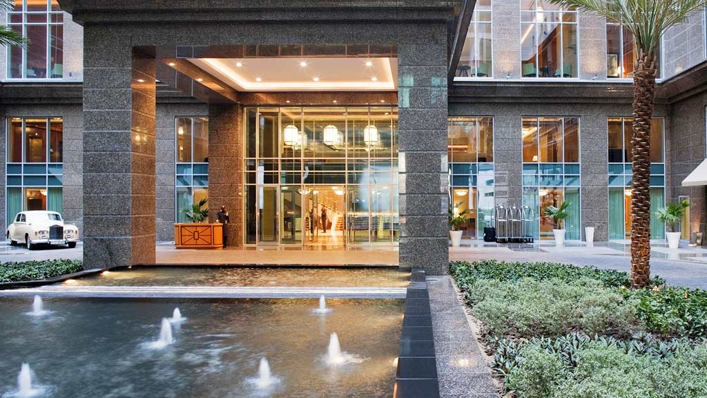 A building with a pool of water.