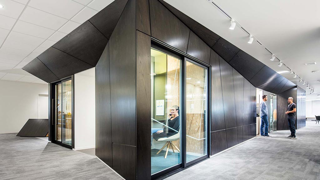 A group of people in a building.