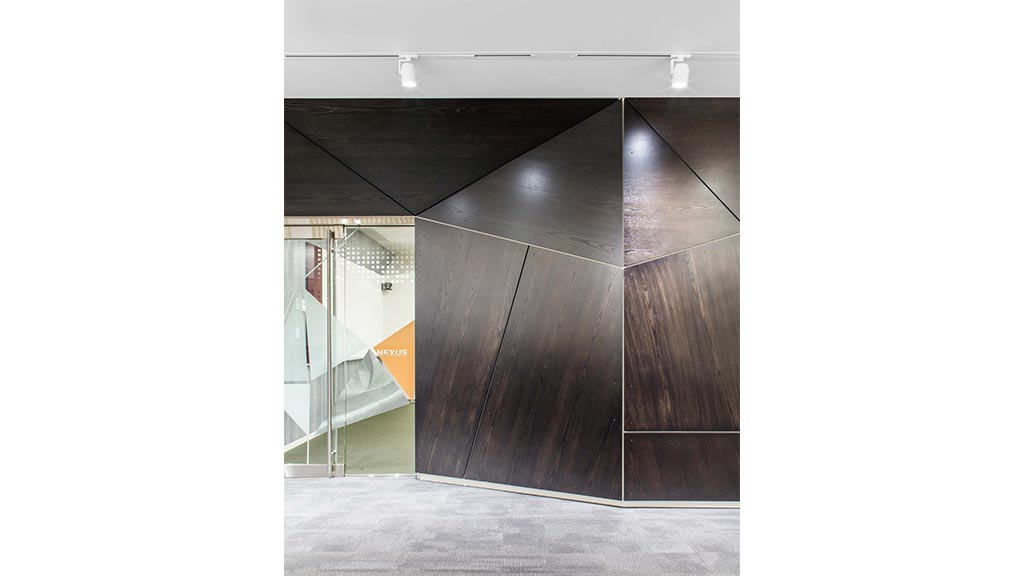 A wooden floor with a glass door.