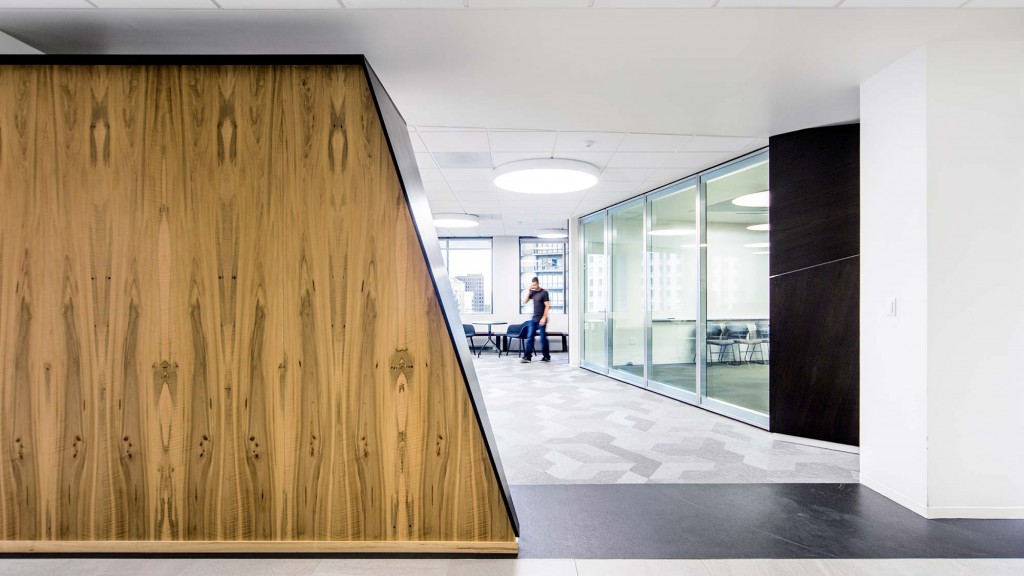 A person walking in a hallway.