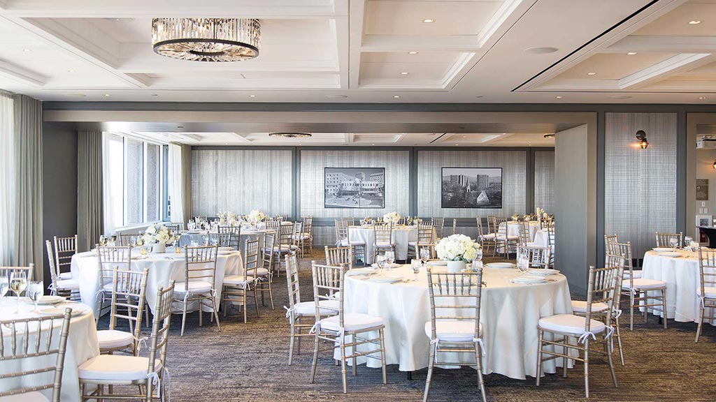 A room with tables and chairs.