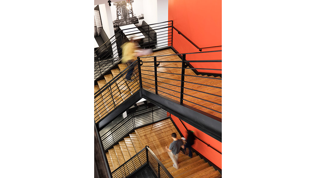 People walking up a flight of stairs.