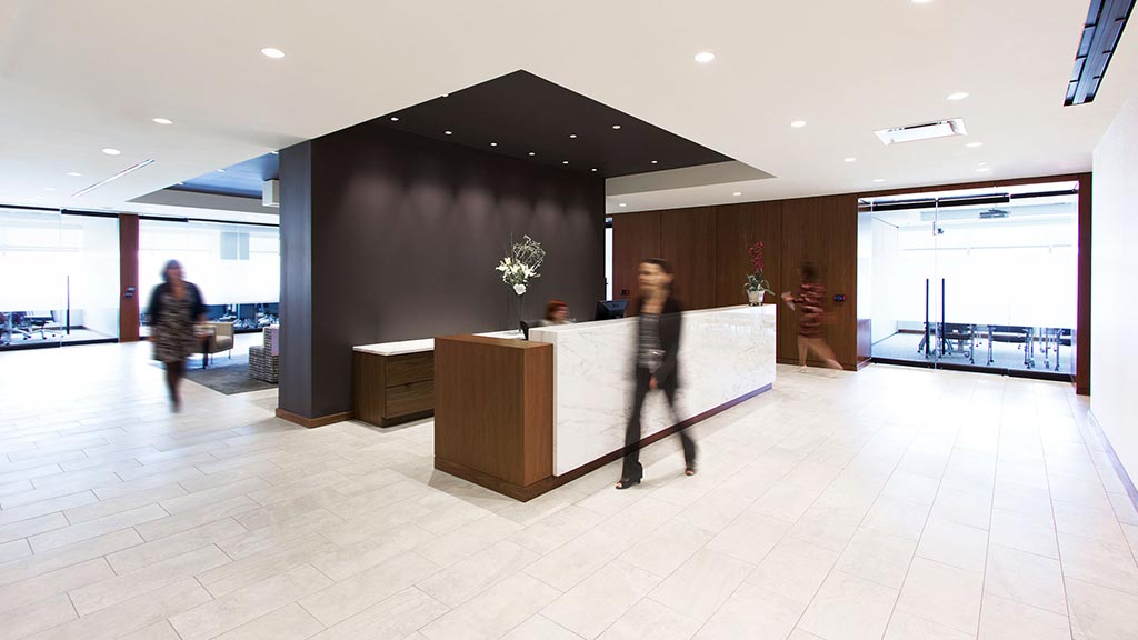 A person walking in a large room.