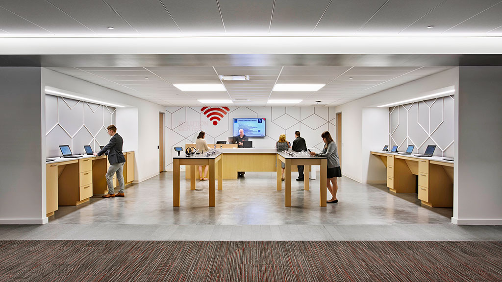 A group of people in an office.