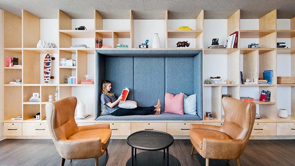 A person sitting on a couch.