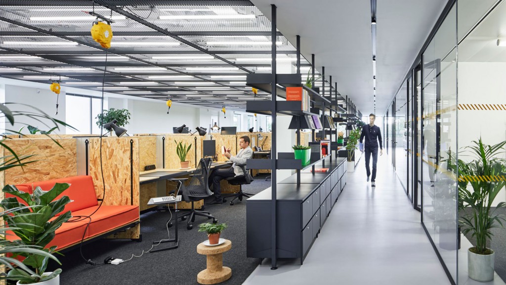 A man and a woman in an office.