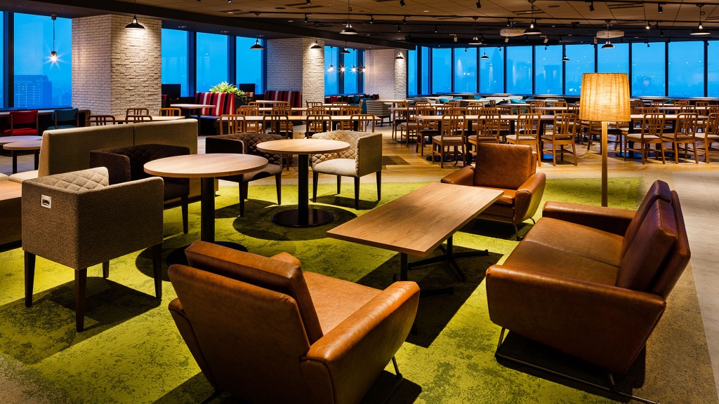 A room with tables and chairs.