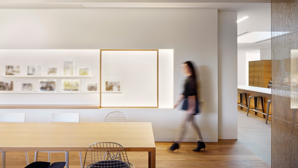 A person walking in a room.