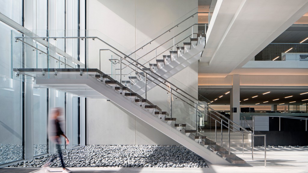 A person walking up a staircase.