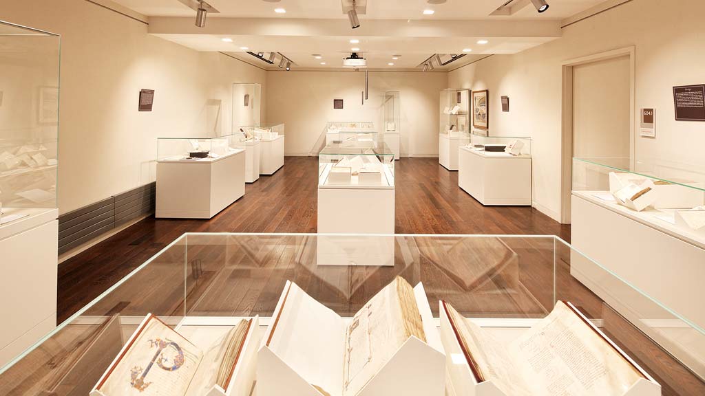 A large room with white counter tops.