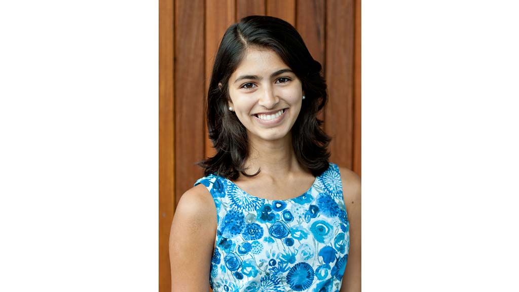 A woman smiling for the camera.