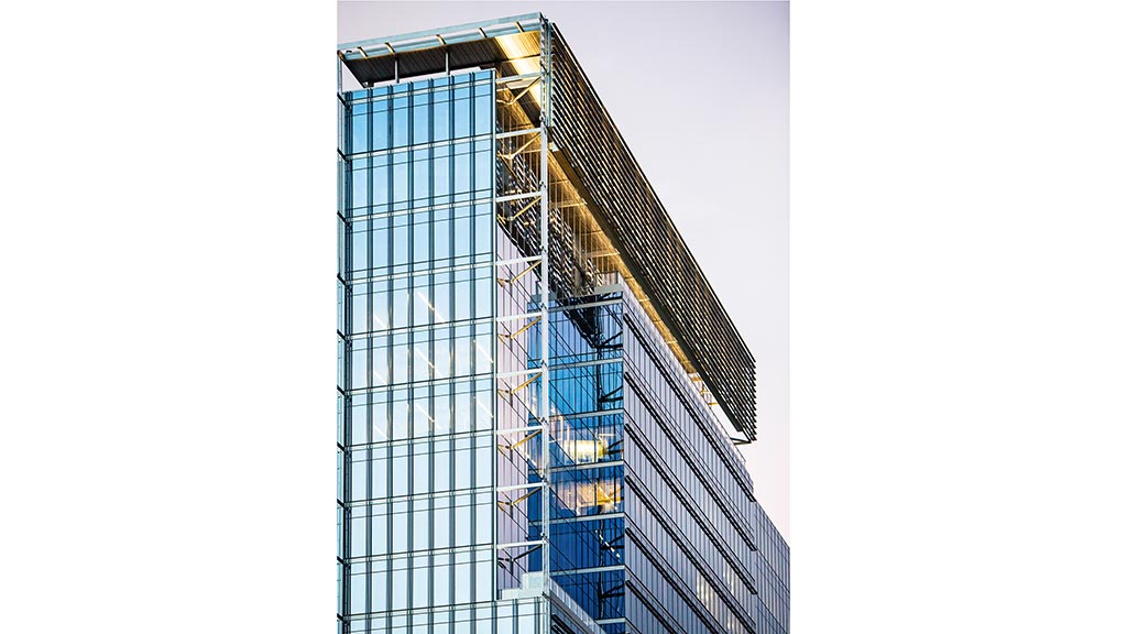 A tall building with glass windows.