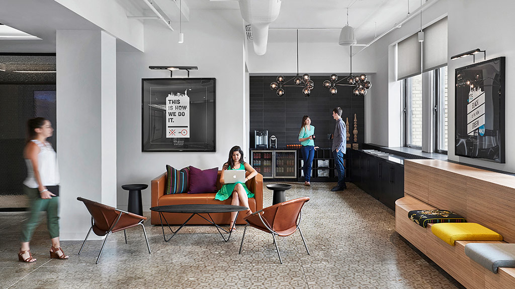 A group of people in a room.