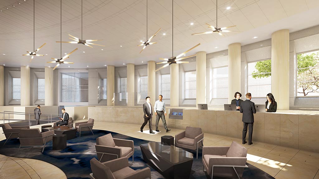 A group of people in a large room with a large white ceiling.