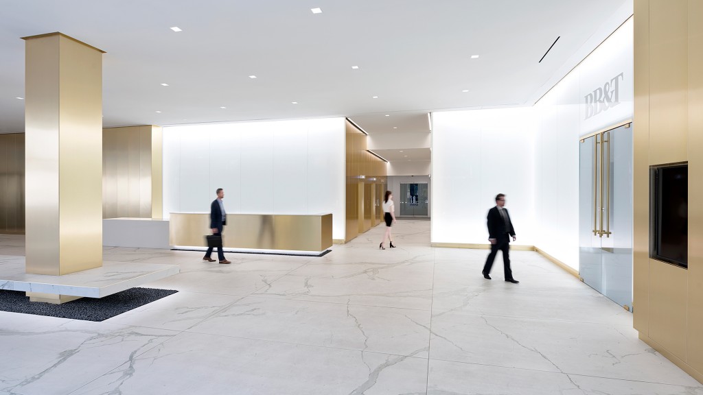People walking in a large building.