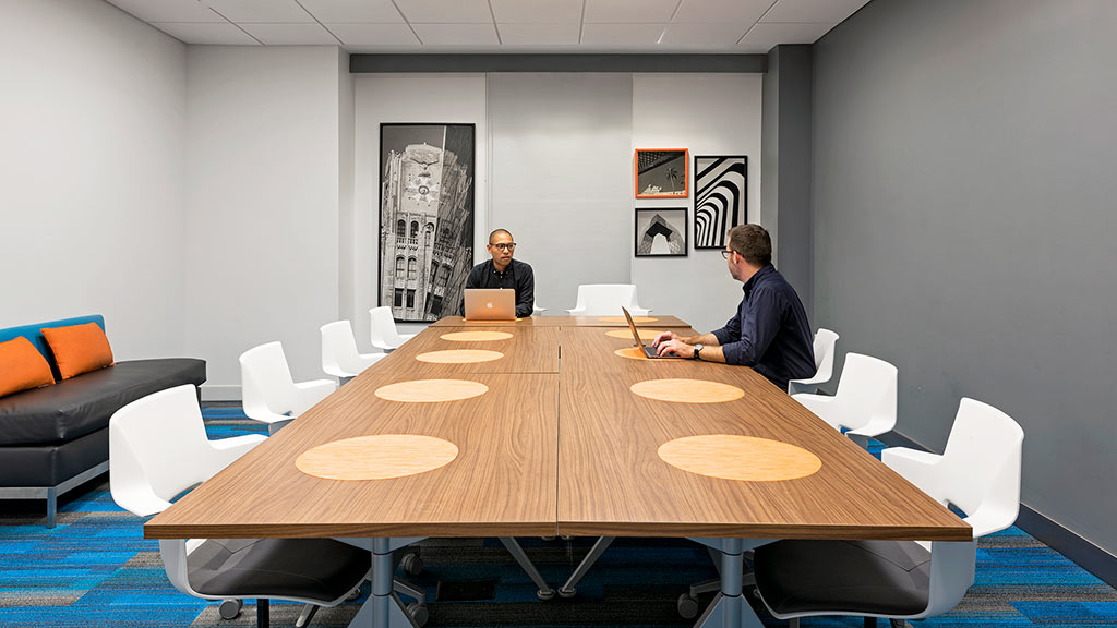 Men sitting at a table.