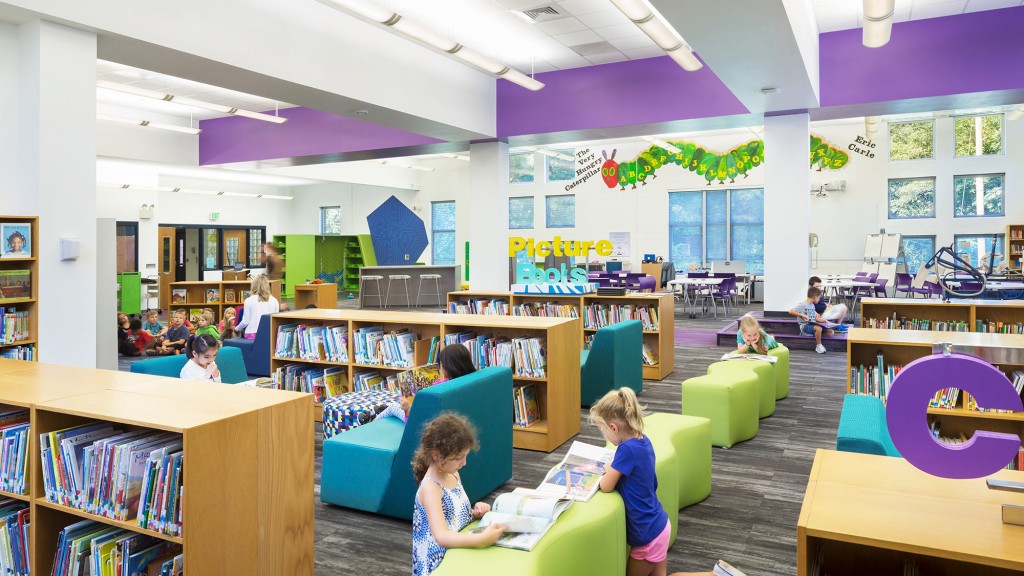 A group of children in a library.