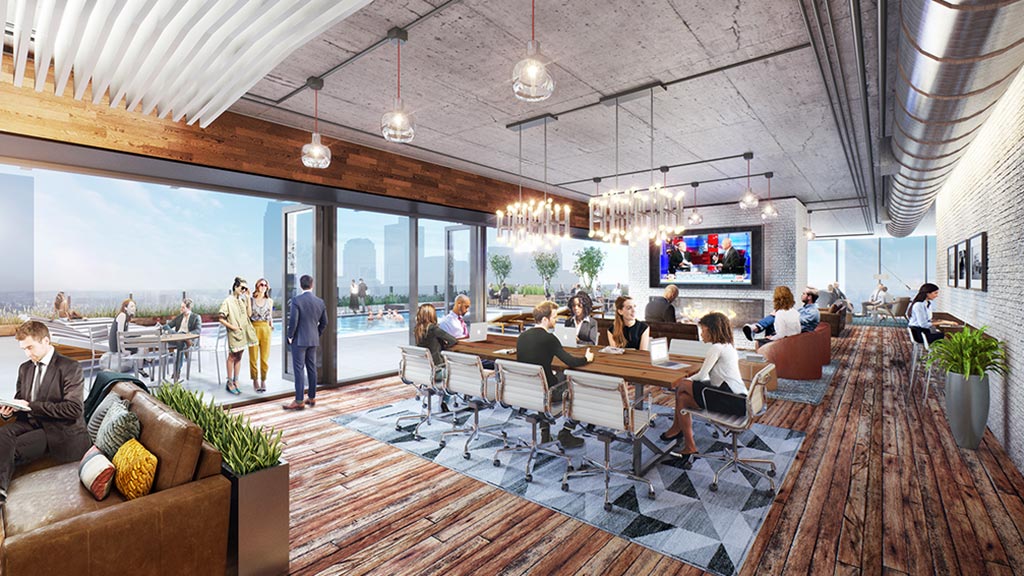 A group of people sitting around a table in a room with a large window.