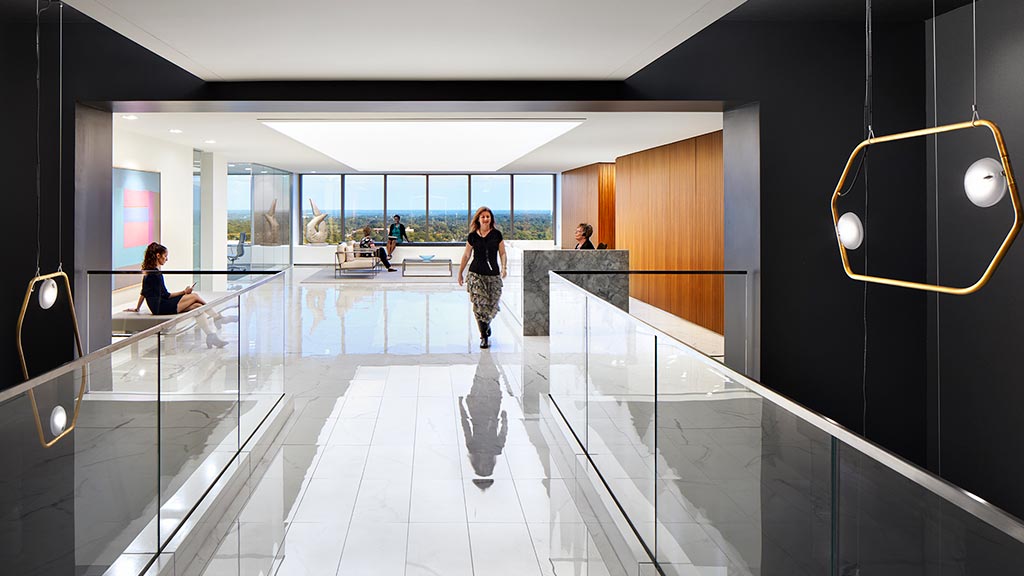 A person walking in a hallway.