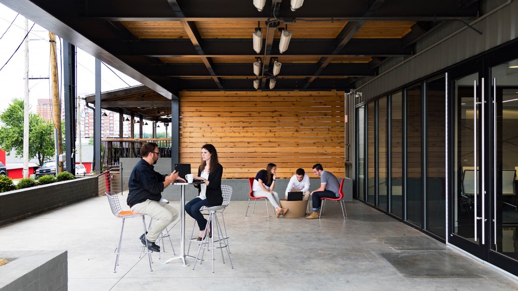 A group of people sitting outside.
