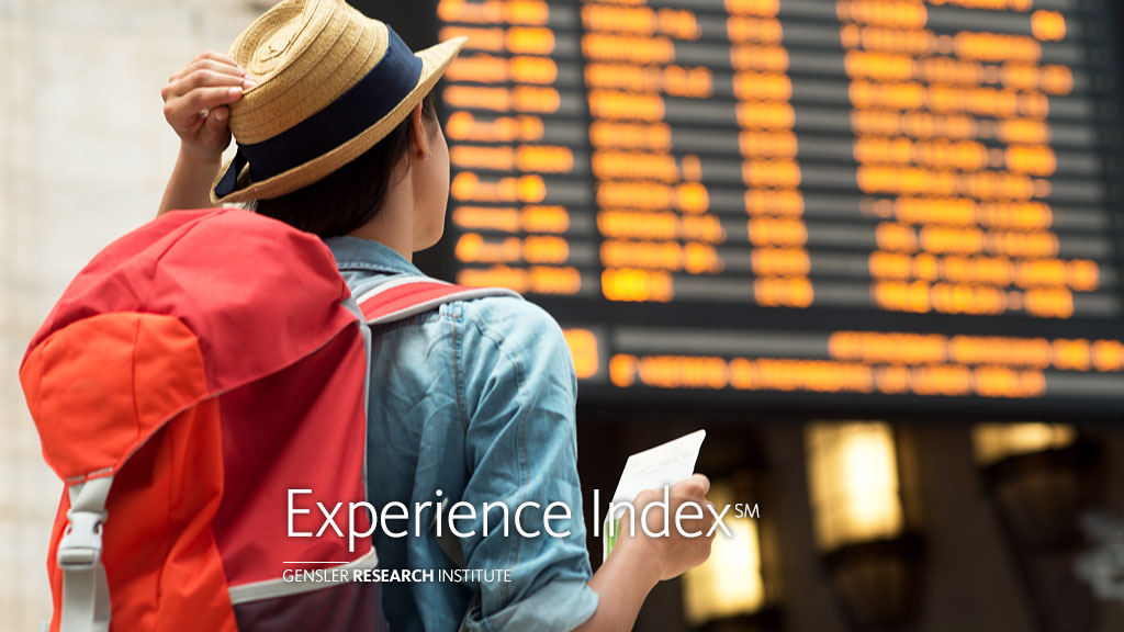 A person wearing a hat and holding money.