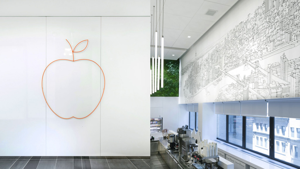 A room with a wall of art.