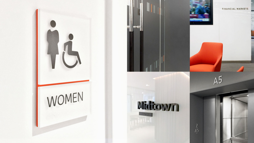 A white board with a black chair and a red chair.