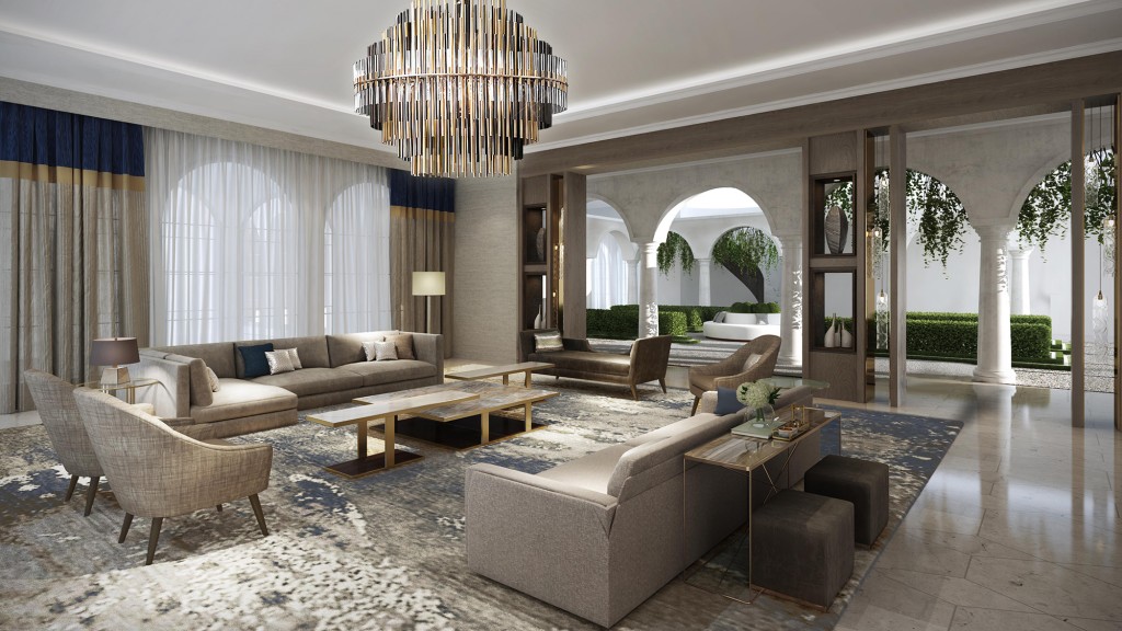 A living room with a chandelier and a couch.