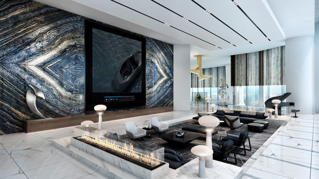 A room with a large screen and chairs.