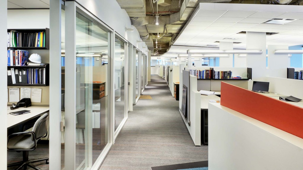 A long hallway with glass doors.