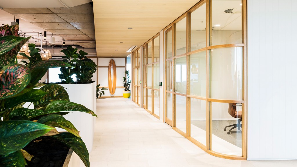 A hallway with glass doors.