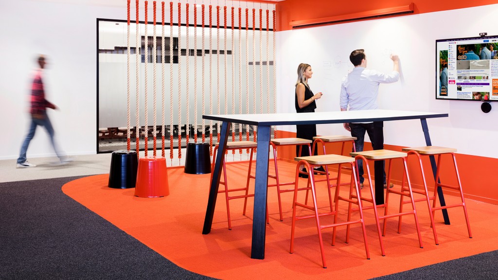 A group of people in a room.