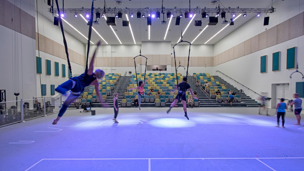 A group of people playing volleyball.