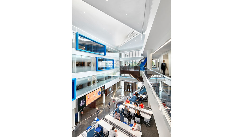 A group of people in a building.