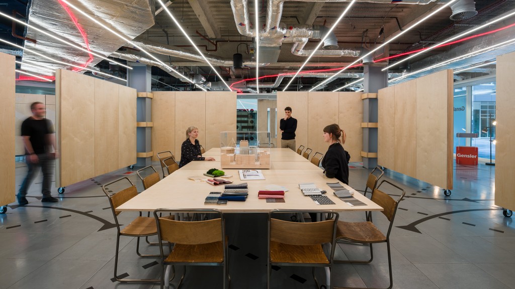 A group of people in a conference room.