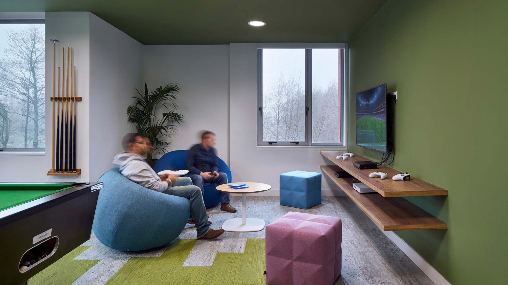 Men sitting on a couch.