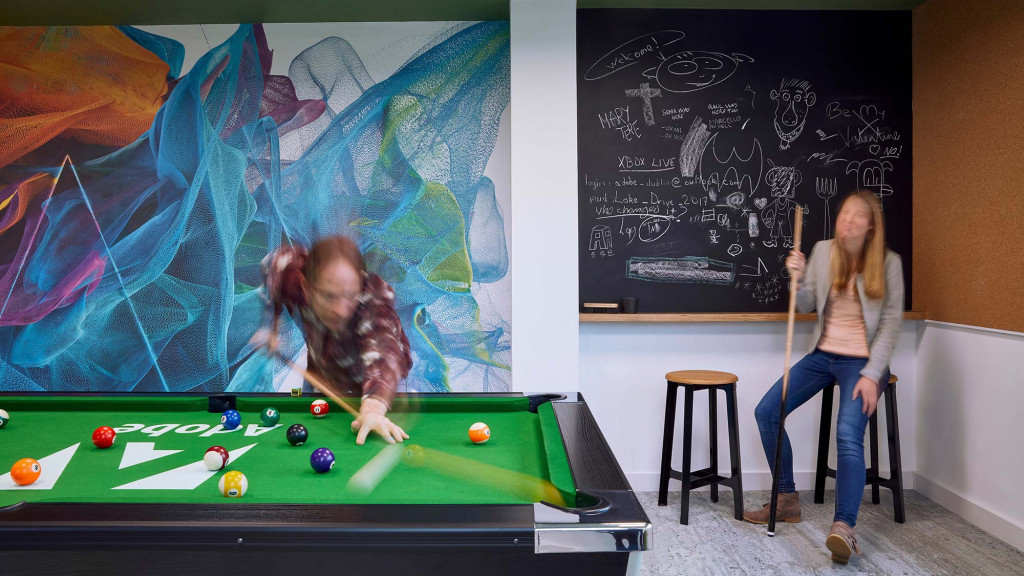 A person playing pool.