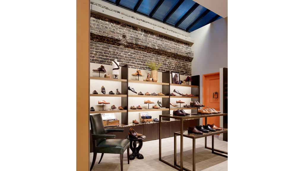 A room with shelves and shoes.