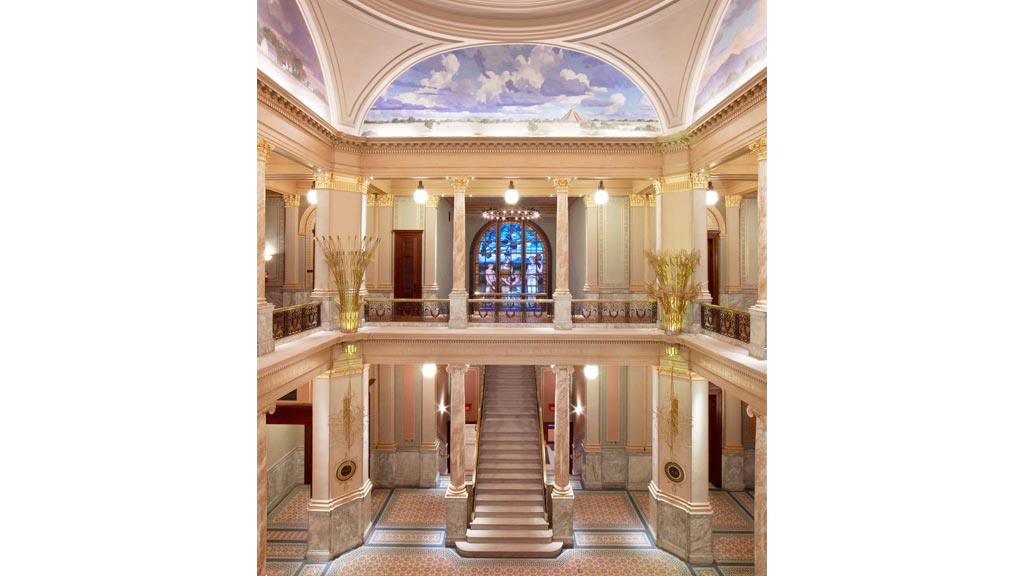 A large ornate building with a staircase.