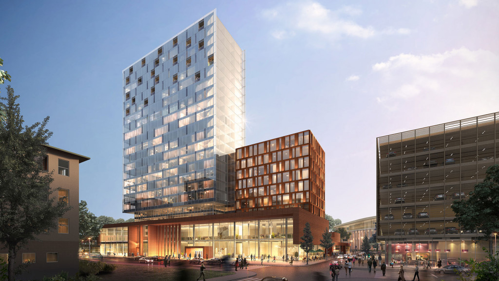 A group of buildings with people walking around.