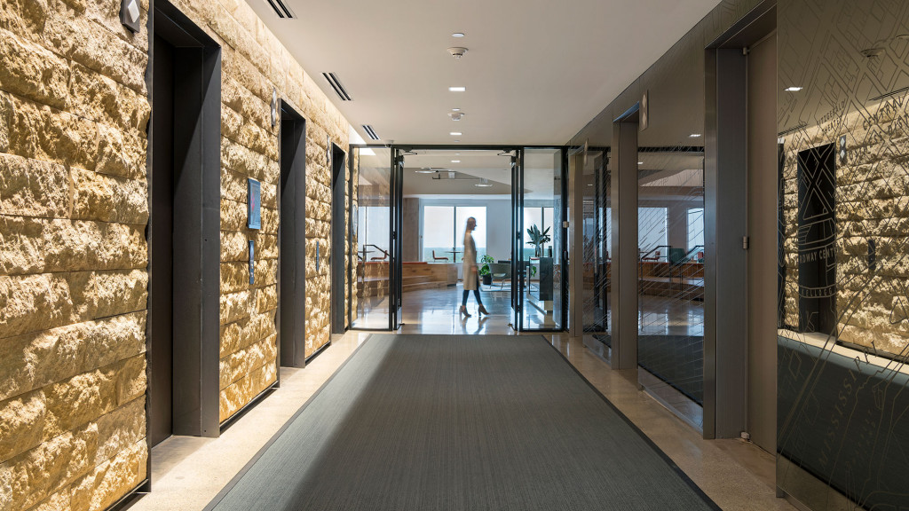 A person walking through a building.