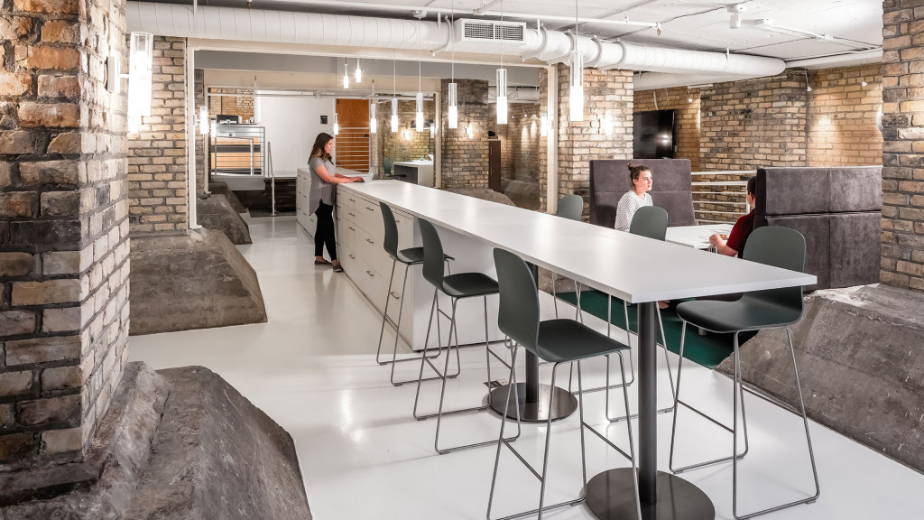 A group of people sitting around a table.