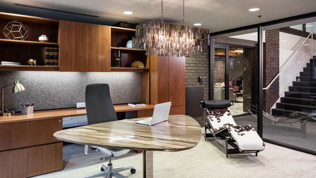 A room with a table and chairs.